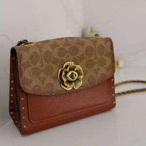 Coach Parker Bag with Signature Canvas and Rivets
